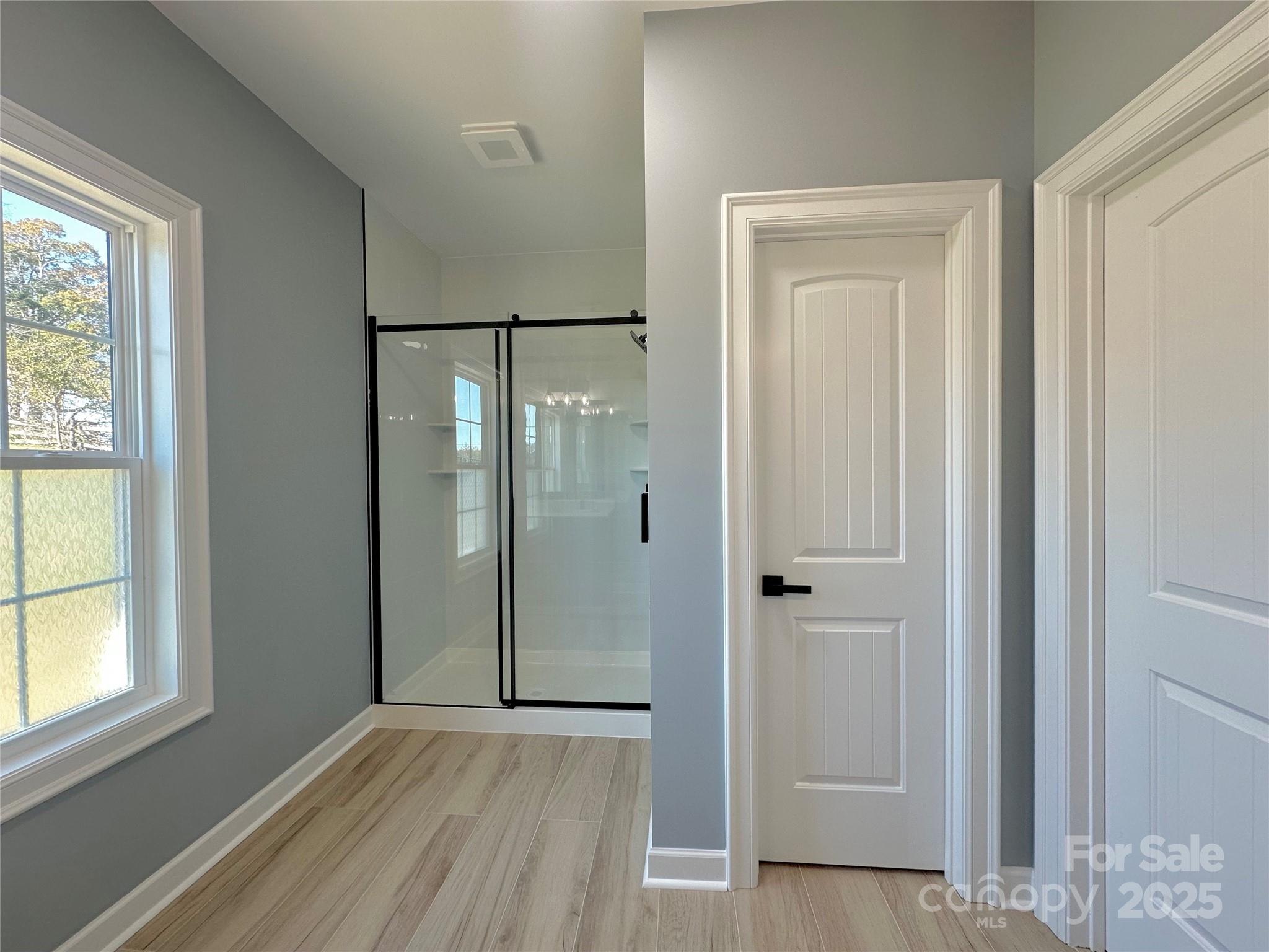 2667 Polo Lane Maiden, NC 28650 - Photo 18 of 36 an empty room with windows and closet