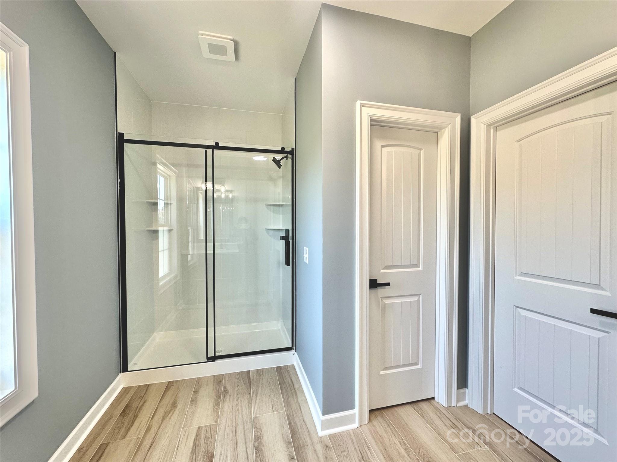 2667 Polo Lane Maiden, NC 28650 - Photo 19 of 36 a view of bedroom with window and a bed