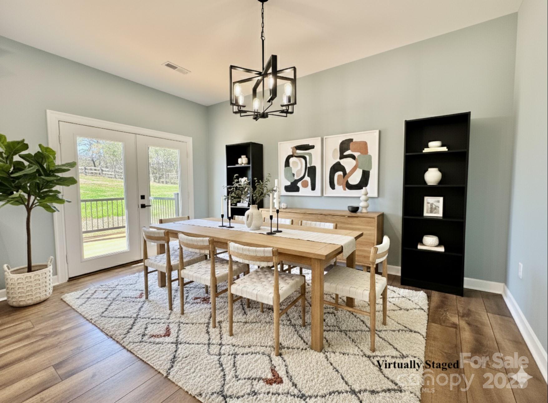 2667 Polo Lane Maiden, NC 28650 - Photo 29 of 36 a view of a dining room with furniture window and wooden floor
