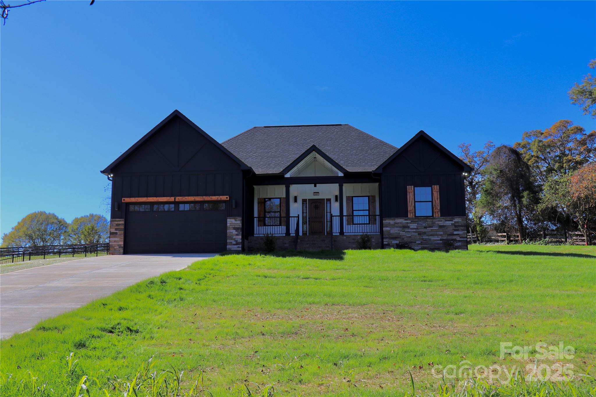 2667 Polo Lane Maiden, NC 28650 - Photo 3 of 36 a front view of a house with yard and green space