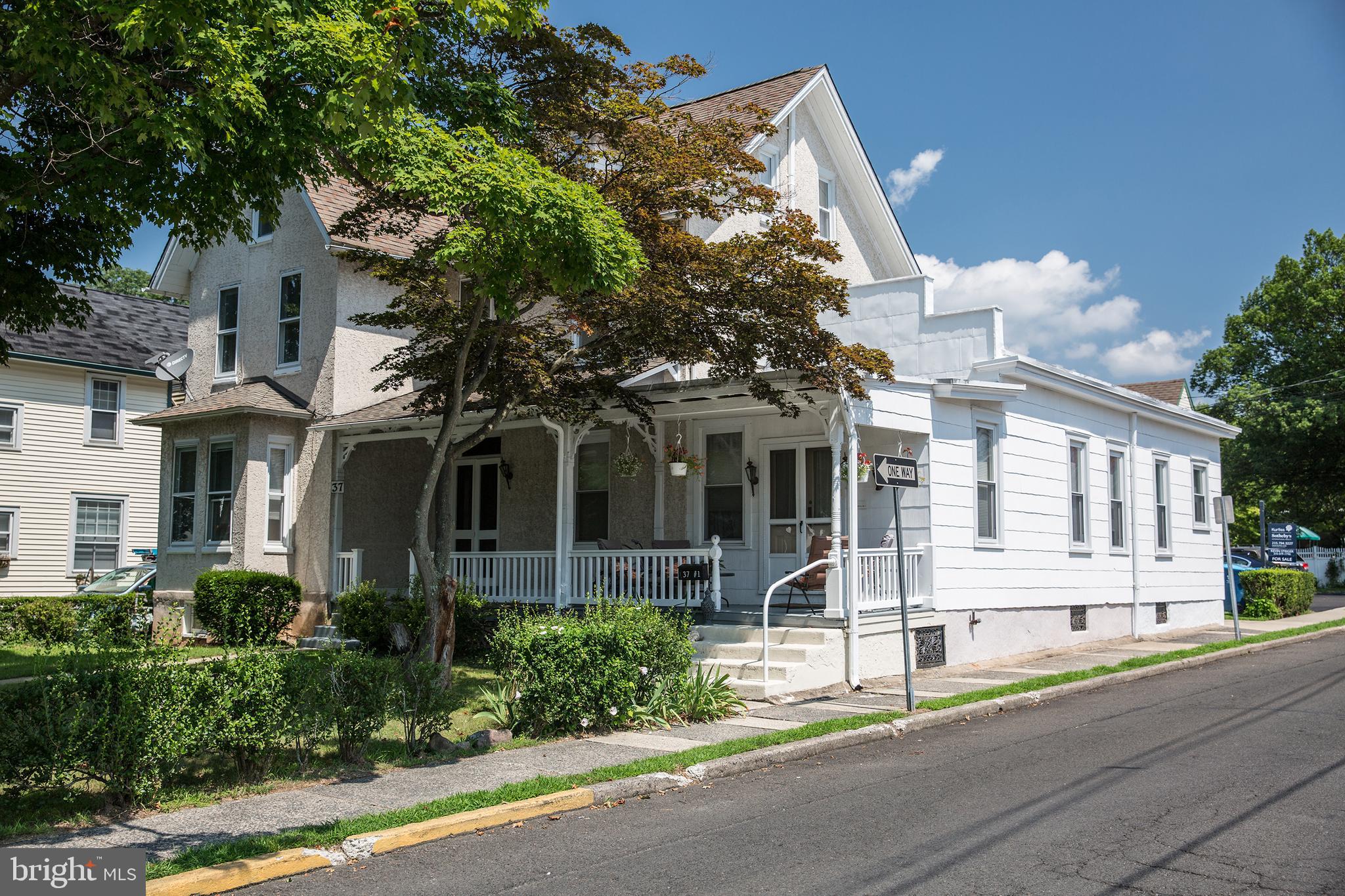 37 North Clinton Street, Unit A Doylestown, PA 18901 - Photo 2 of 11 front view of a house with a street