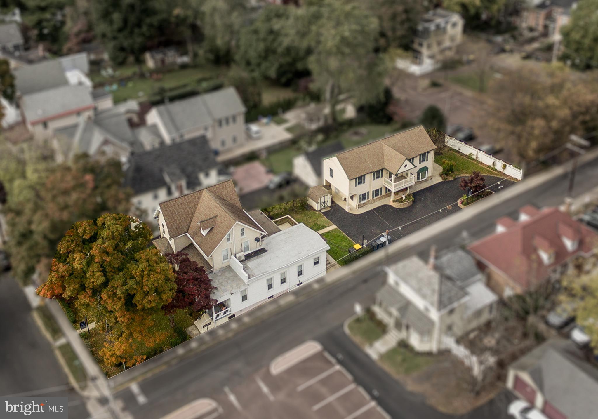 37 North Clinton Street, Unit A Doylestown, PA 18901 - Photo 4 of 11 an aerial view of a house with a yard and lake view