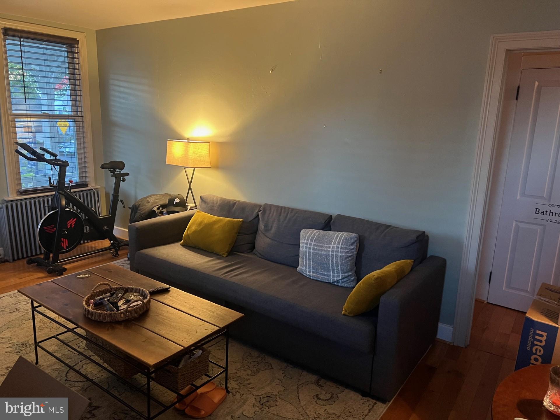 37 North Clinton Street, Unit A Doylestown, PA 18901 - Photo 5 of 11 a living room with furniture and a window