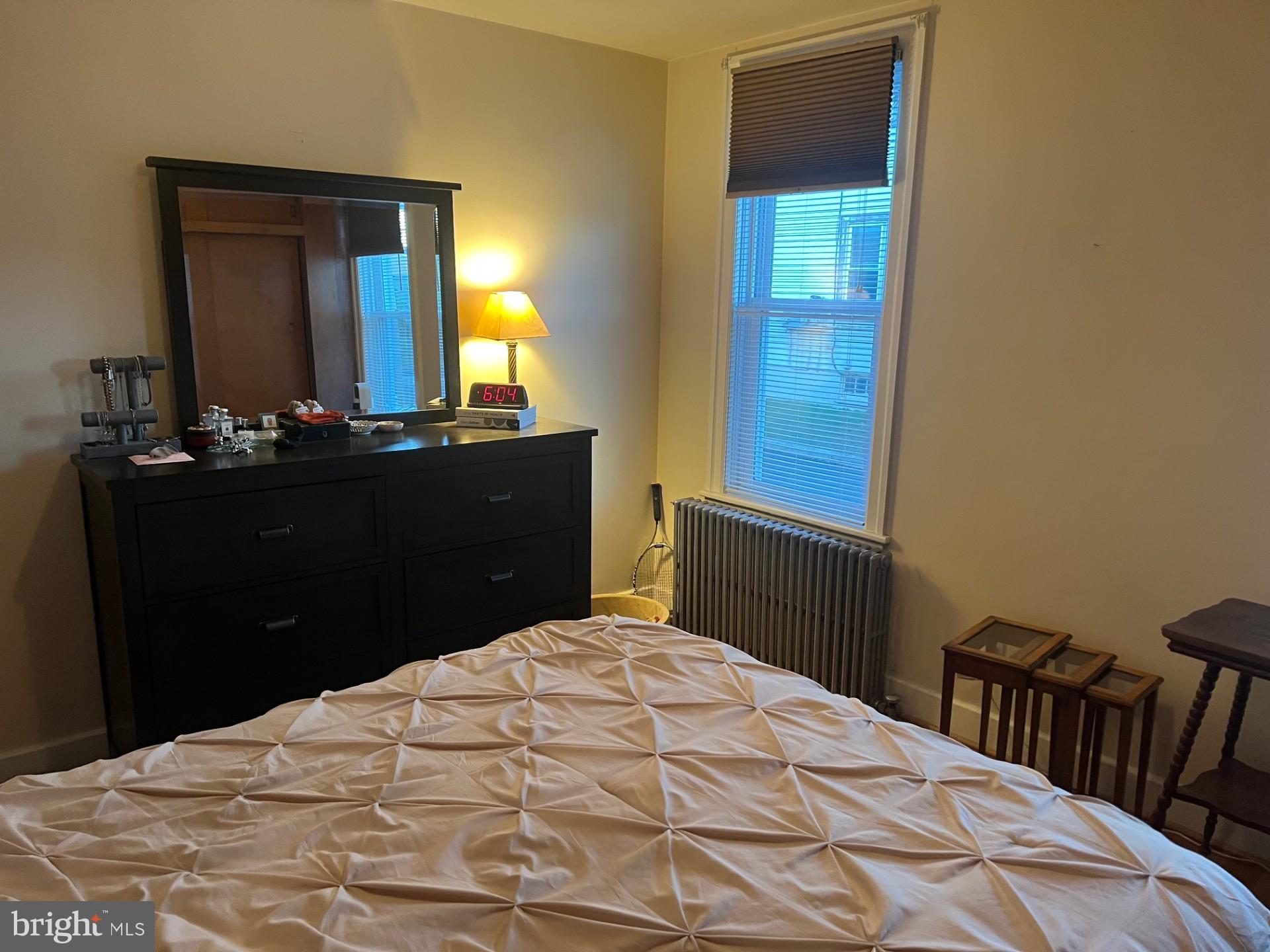 37 North Clinton Street, Unit A Doylestown, PA 18901 - Photo 10 of 11 a bedroom with a bed and a dresser