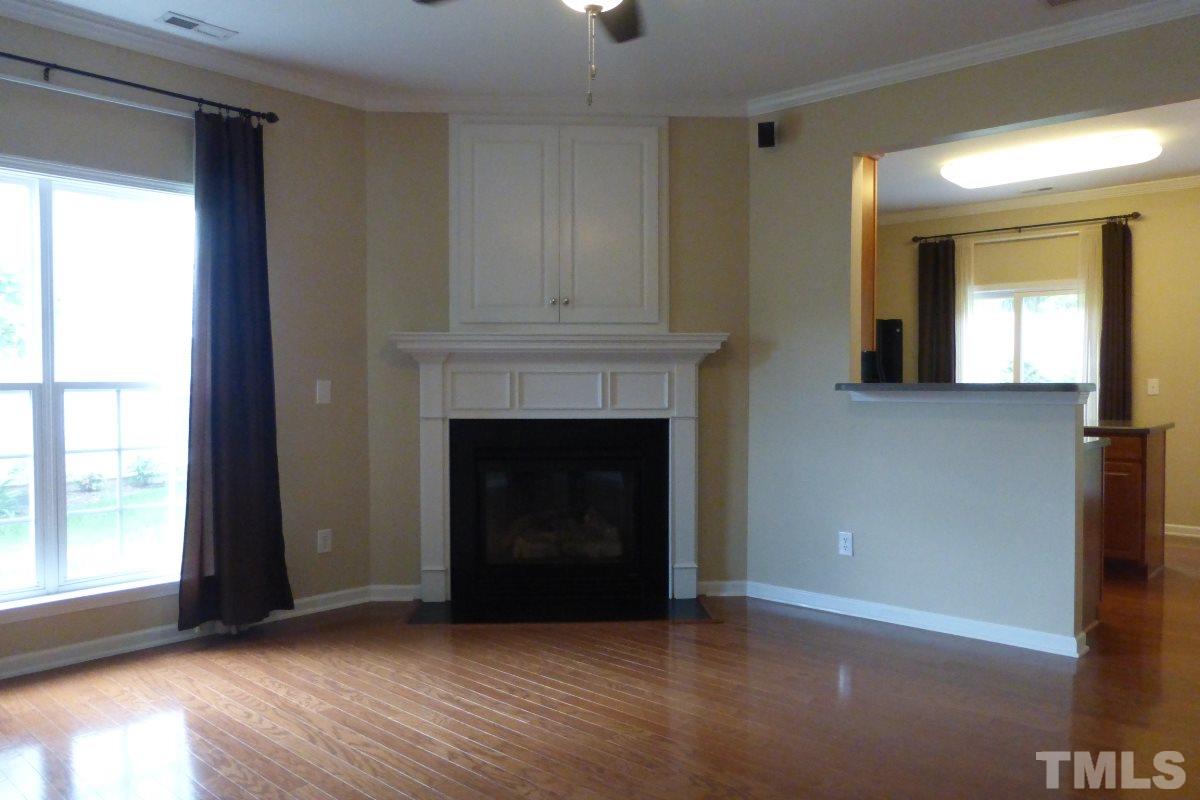 3003 Winding Waters Way Raleigh, NC 27614 - Photo 6 of 17 Return home and relax downstairs in the open family, dining and kitchen areas.