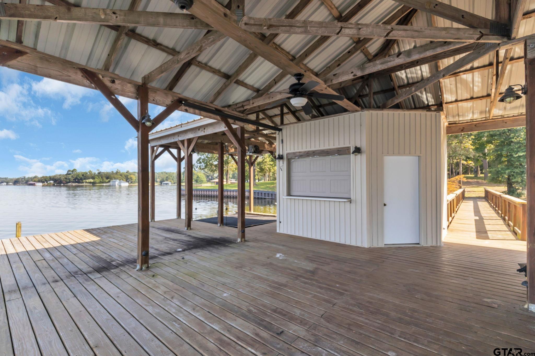 0 Eastside Road, Unit 3 Tyler, TX 75707 - Photo 6 of 33 a view of a porch with wooden floor