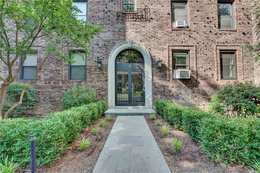 64 Sagamore Road, Unit B3 Bronxville, NY 10708 - Photo 1 of 1 a front view of a house with garden
