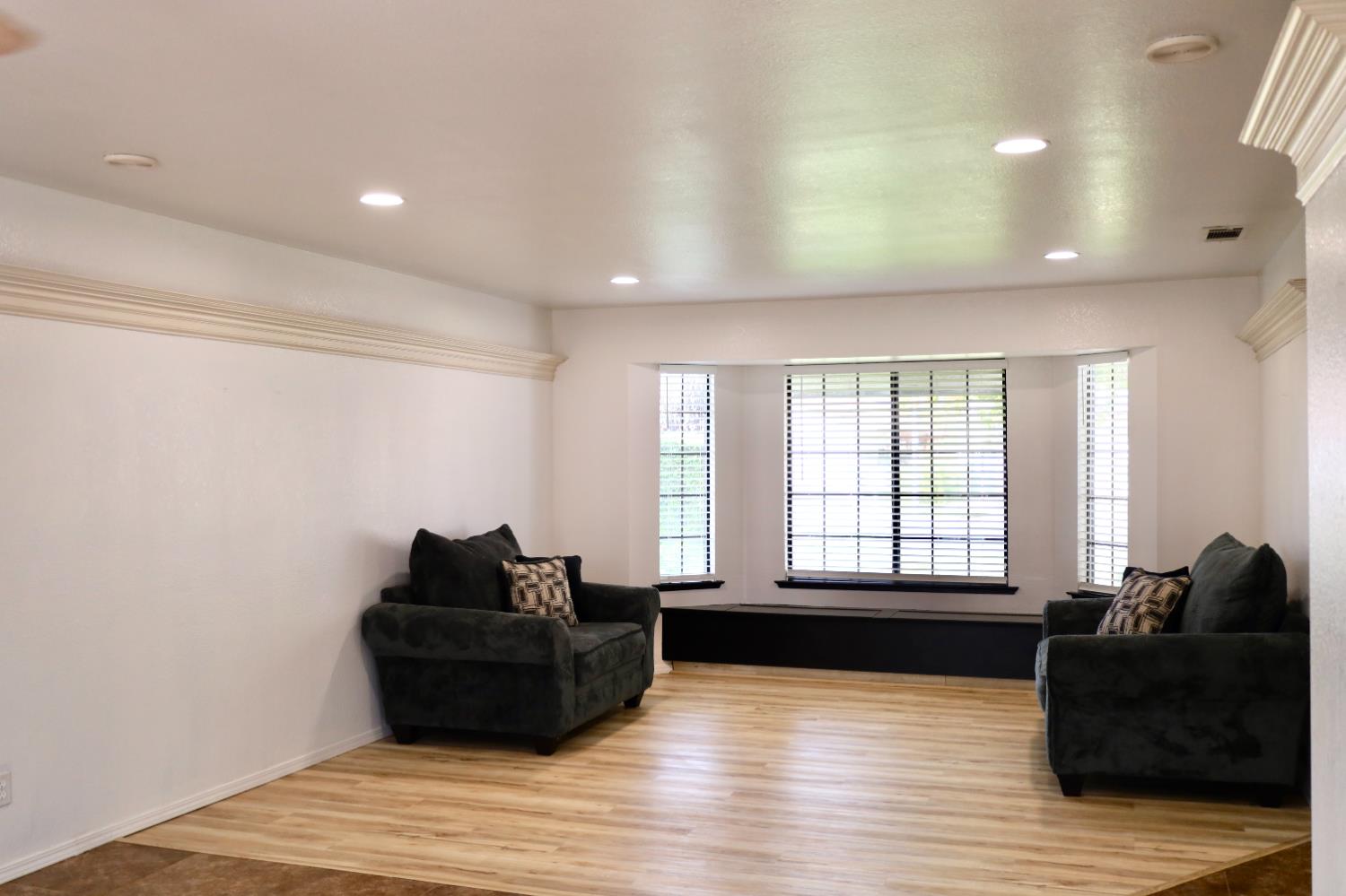 3040 Boulder Avenue Madera, CA 93637 - Photo 12 of 50 a living room with furniture window and wooden floor