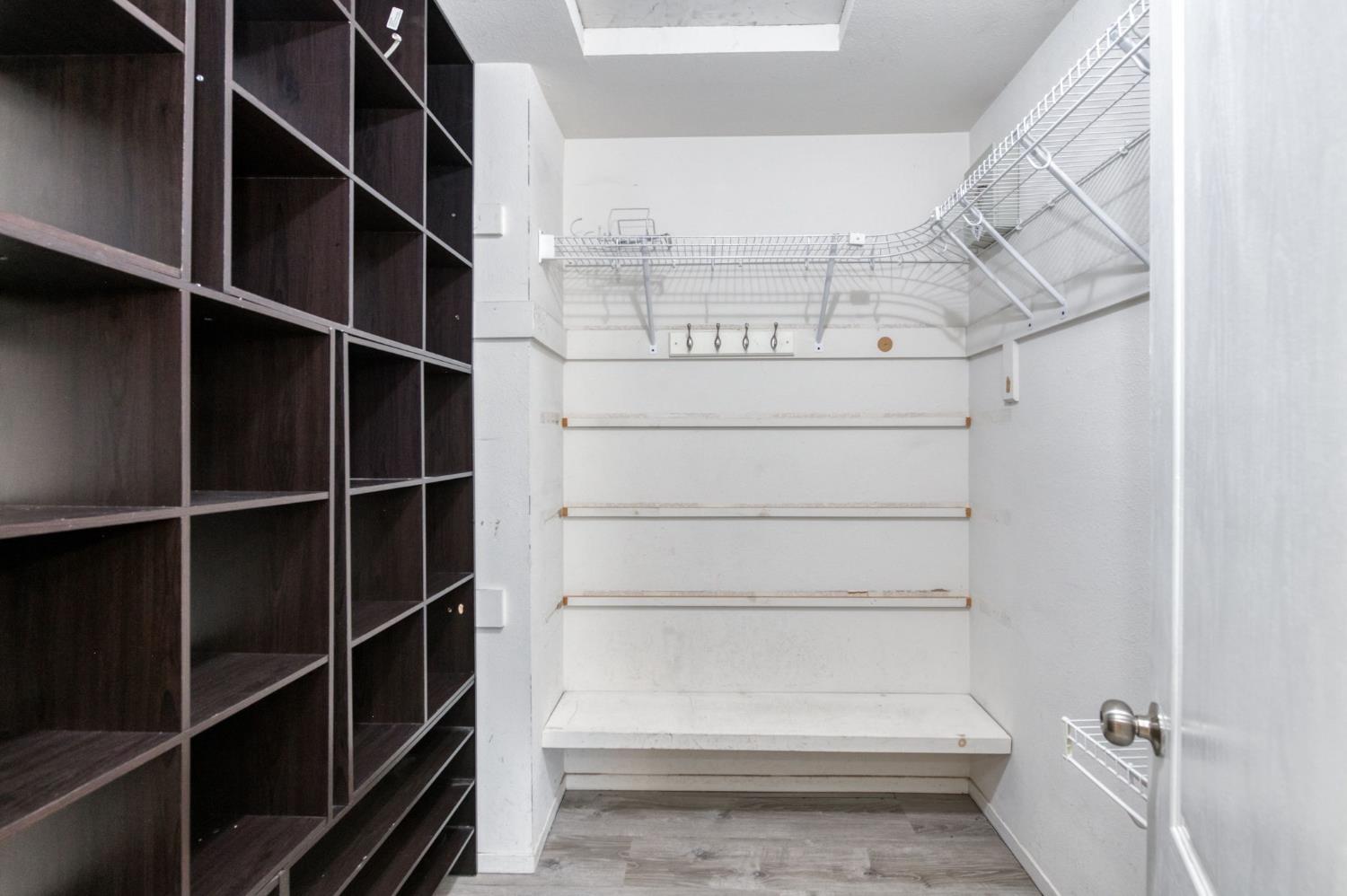 3040 Boulder Avenue Madera, CA 93637 - Photo 27 of 50 a view of walk in closet with empty racks