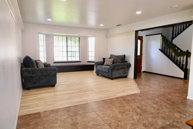 a living room with furniture and a couch