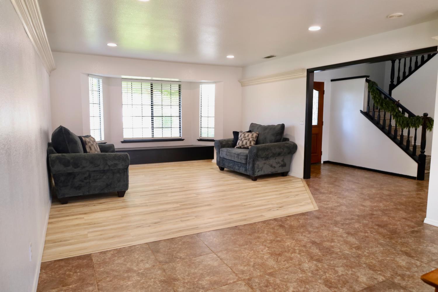 3040 Boulder Avenue Madera, CA 93637 - Photo 10 of 50 a living room with furniture and a flat screen tv