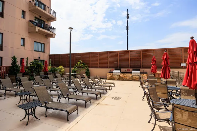 a view of yard with outdoor seating