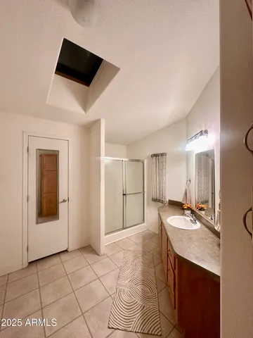 a view of a hallway with seating area