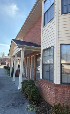 a view of a house with a porch