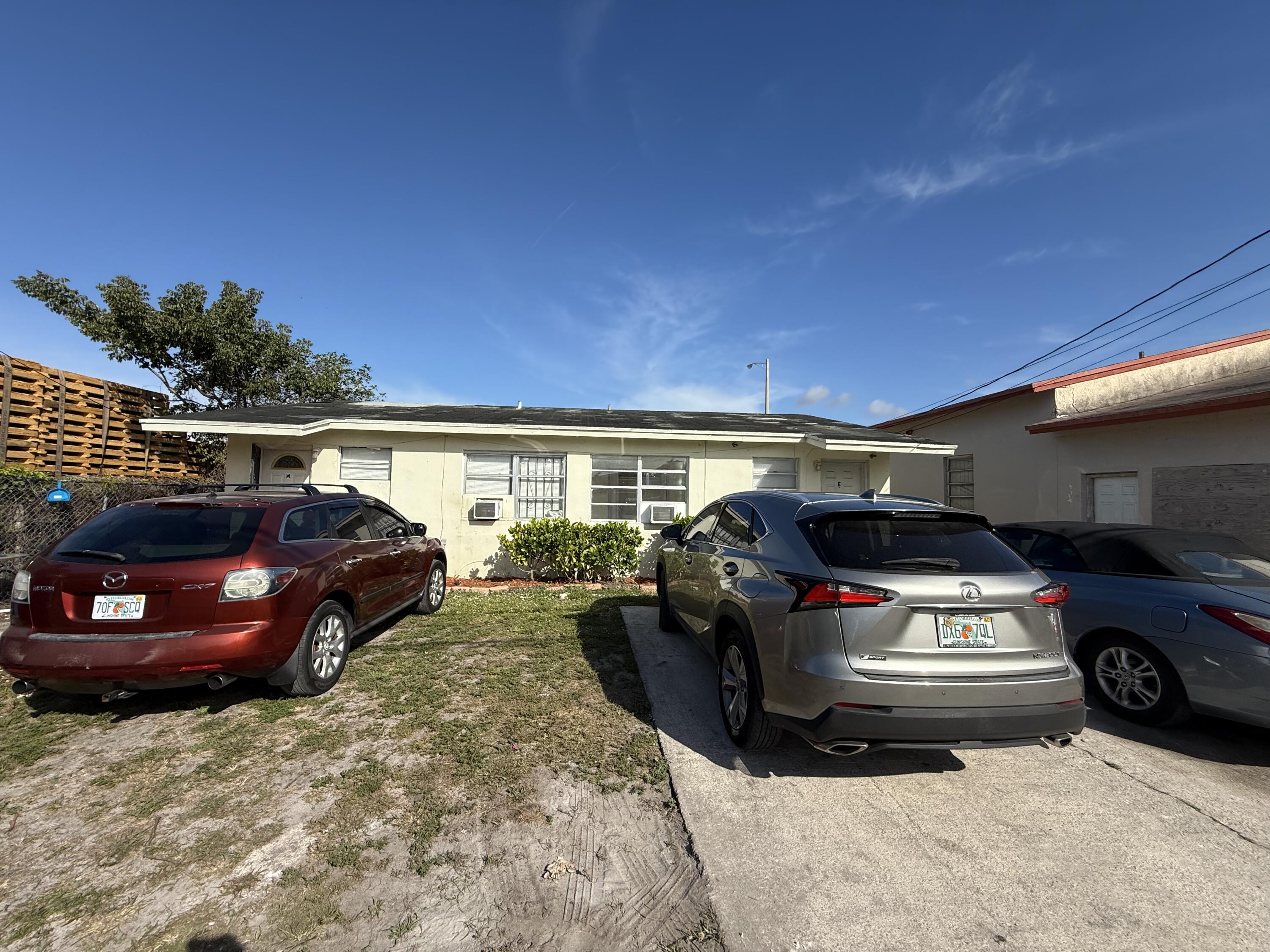 4800 Pembroke Road West Park, FL 33021 - Photo 8 of 10 a car parked in parking