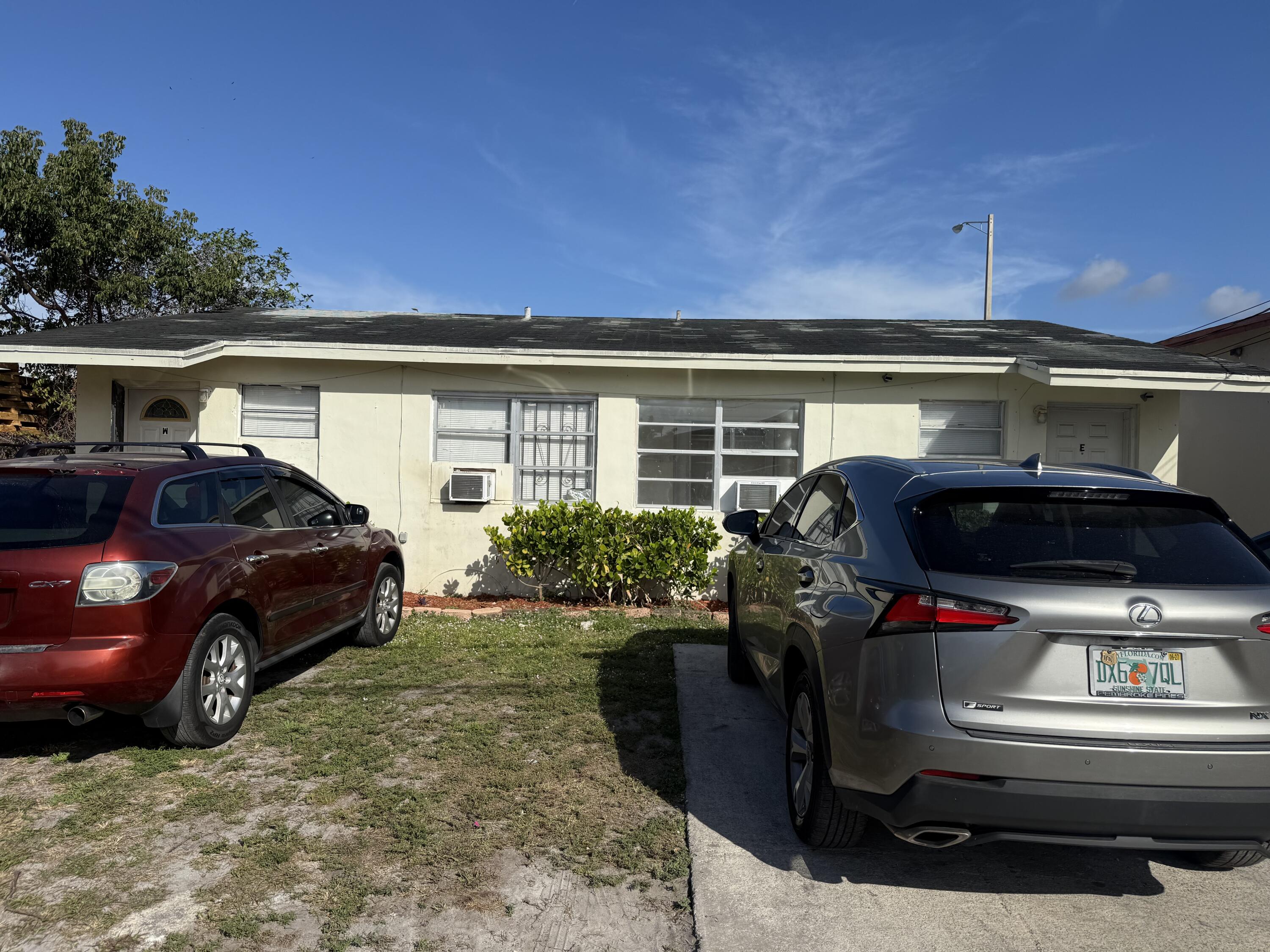 4800 Pembroke Road West Park, FL 33021 - Photo 9 of 10 a car parked in front of a house