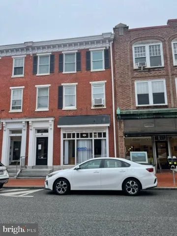 a car parked in front of a building