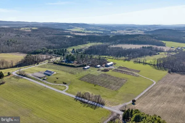 an aerial view of a house with a garden