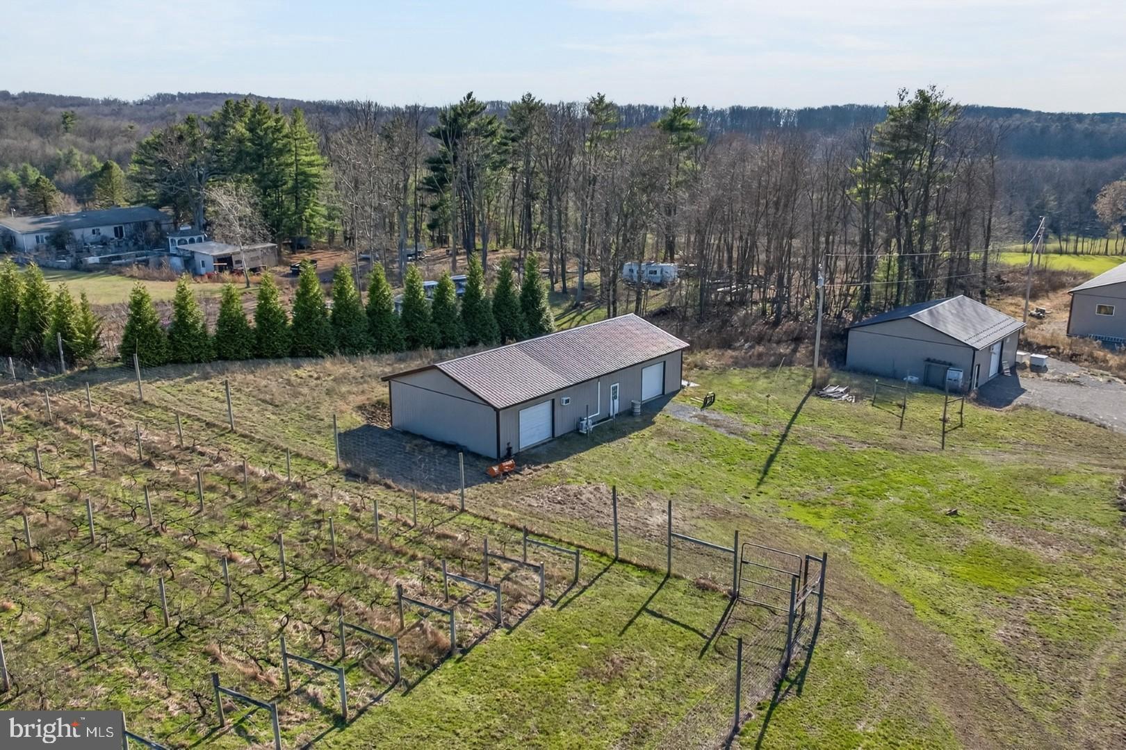 596 Harman Road Halifax, PA 17032 - Photo 22 of 34 a view of a chairs and table in the backyard