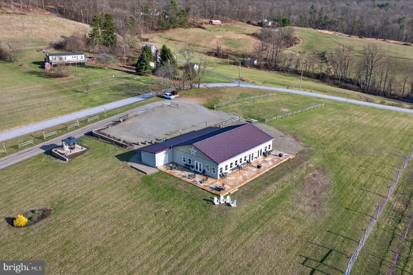 596 Harman Road Halifax, PA 17032 - Photo 32 of 34 a aerial view of a garden with an outdoor space