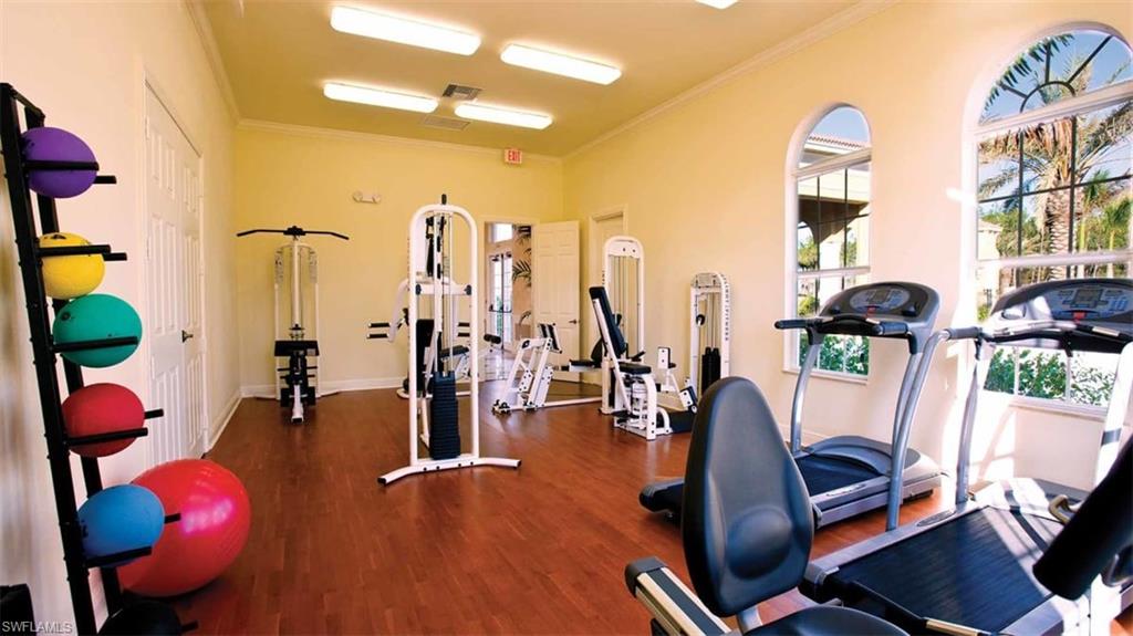 7051 Ambrosia Lane, Unit 3506 Naples, FL 34119 - Photo 3 of 23 a view of a room with gym equipment