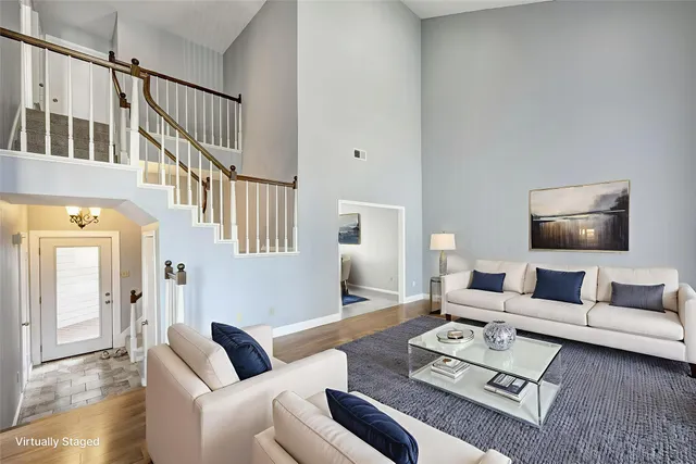 a living room with furniture and a table