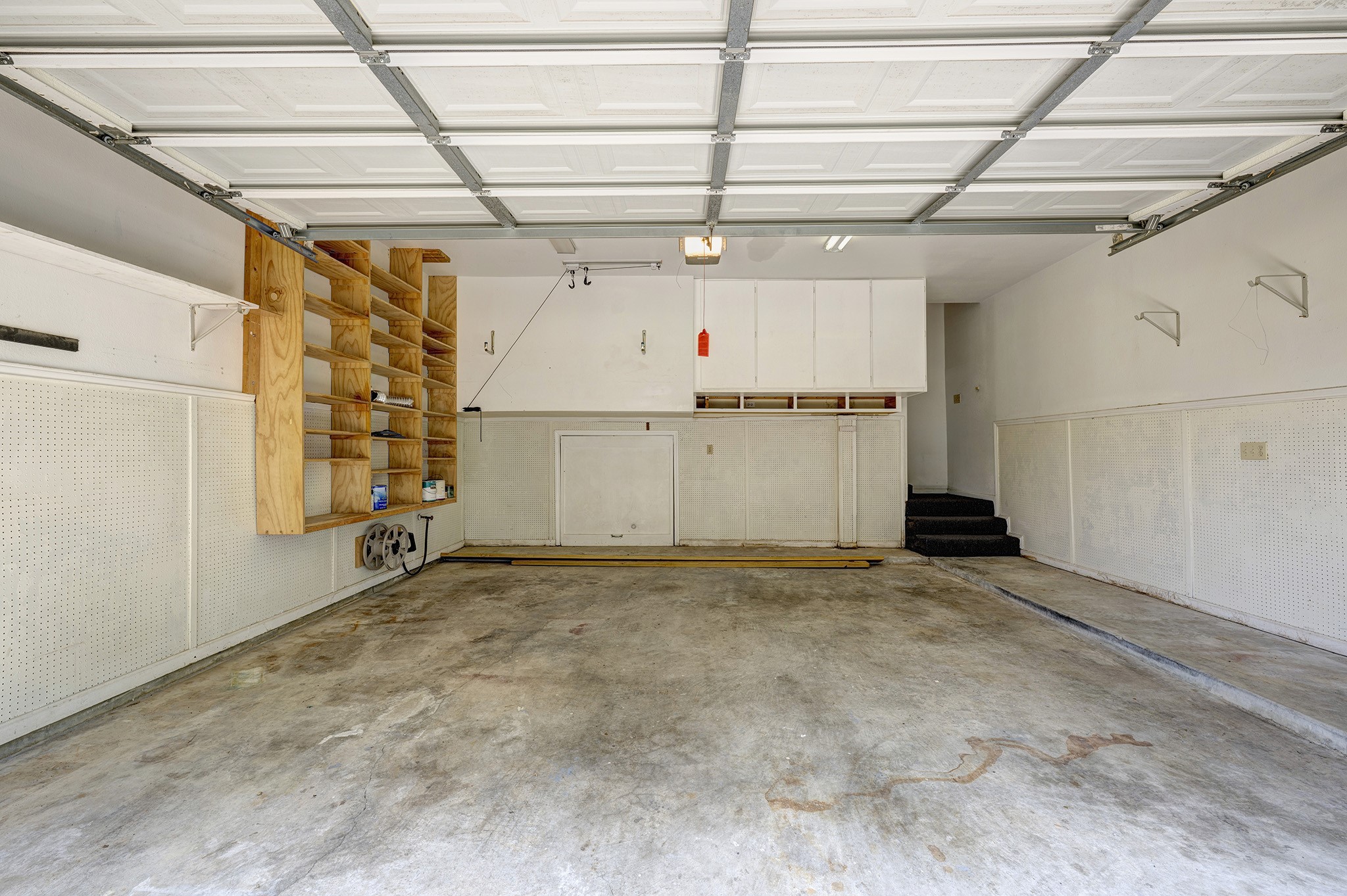 2601 South Broadway Street, Unit 29 La Porte, TX 77571 - Photo 15 of 37 2 car garage with built-ins and hidden storage