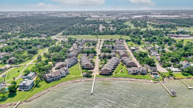 a bathroom with a sink vanity mirror and toilet