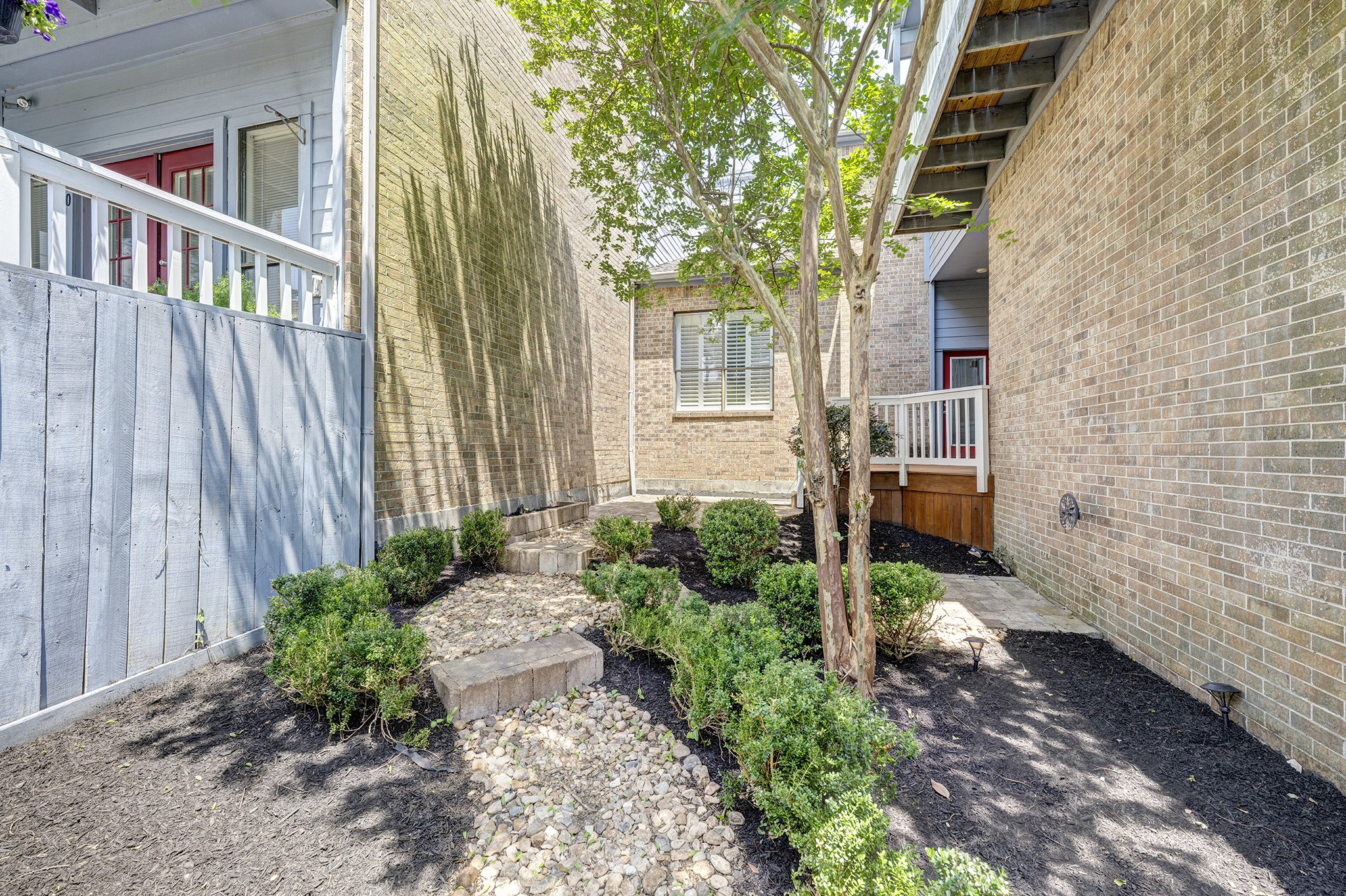 2601 South Broadway Street, Unit 29 La Porte, TX 77571 - Photo 2 of 37 a view of a pathway with a house