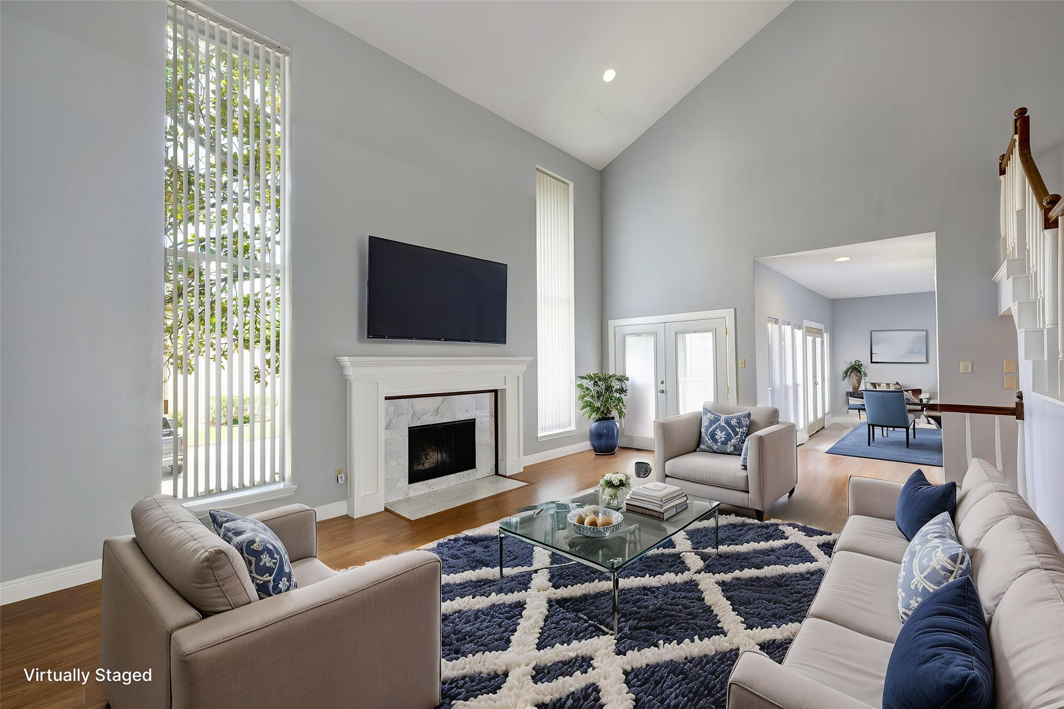 2601 South Broadway Street, Unit 29 La Porte, TX 77571 - Photo 7 of 37 Large open living area with French doors, brick fireplace & floor to ceiling windows