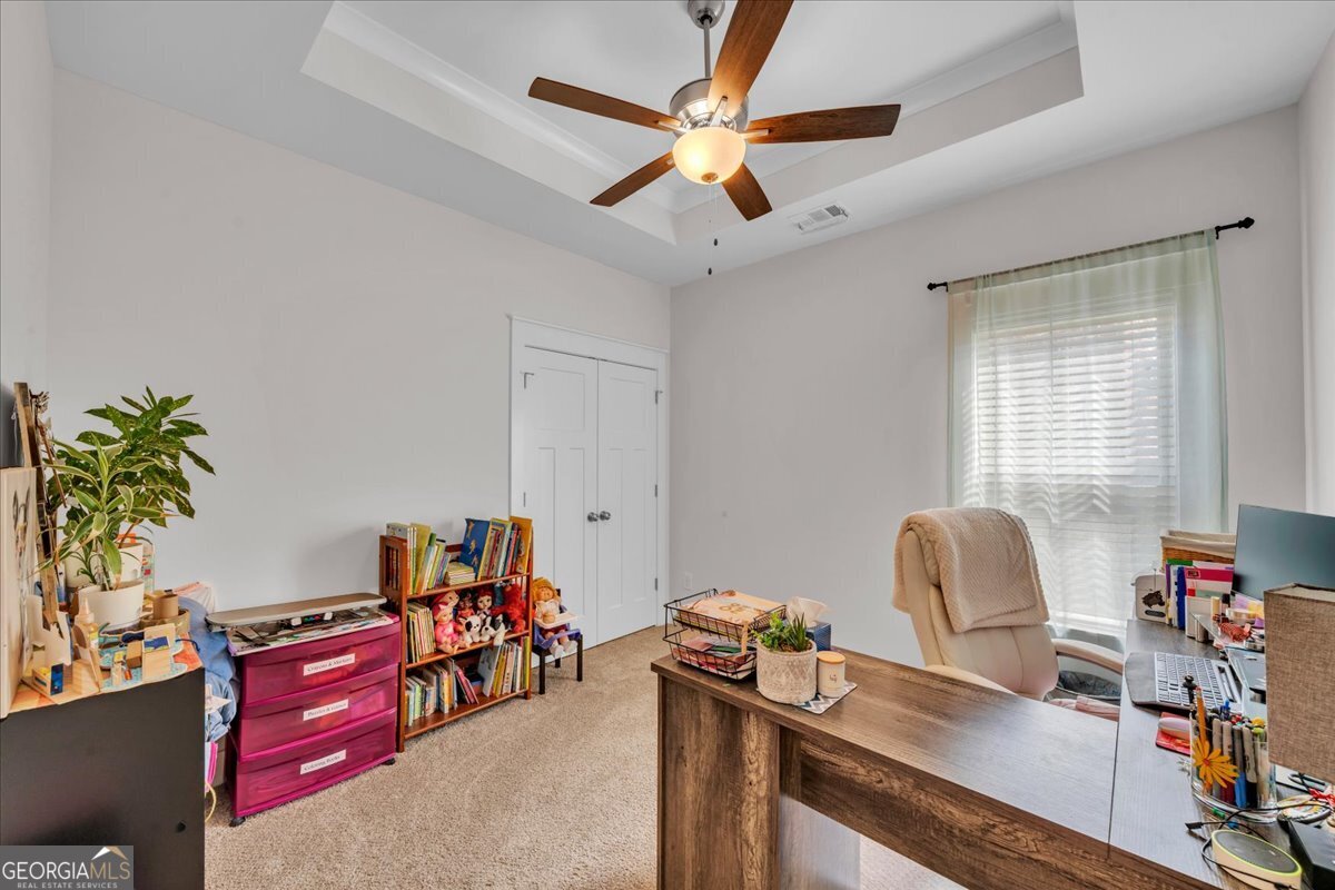 424 Rustic Live Oak Trail Bonaire, GA 31005 - Photo 30 of 51 a room with furniture and a window