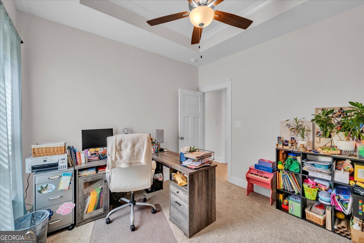 424 Rustic Live Oak Trail Bonaire, GA 31005 - Photo 31 of 51 a view of a workspace with furniture and toys