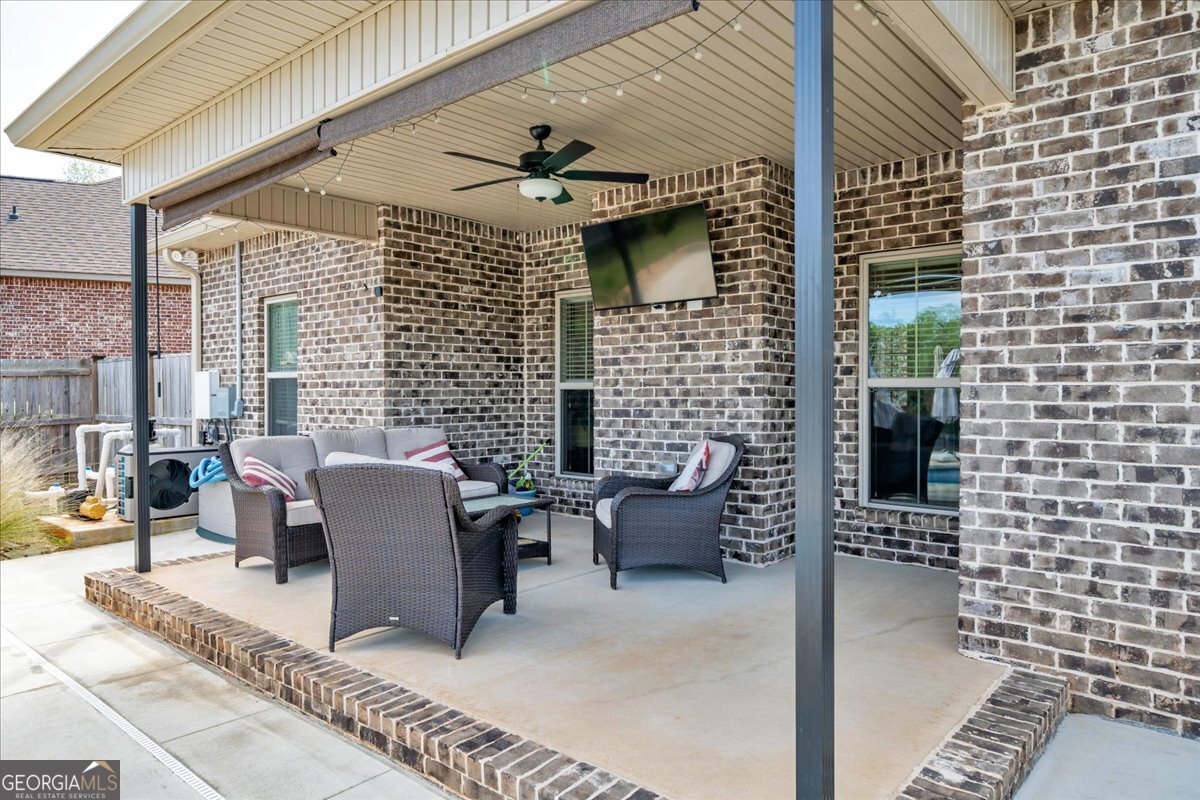 424 Rustic Live Oak Trail Bonaire, GA 31005 - Photo 38 of 51 a balcony with furniture