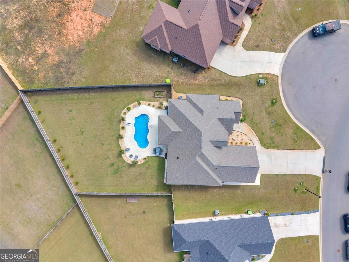 424 Rustic Live Oak Trail Bonaire, GA 31005 - Photo 39 of 51 an aerial view of residential houses with outdoor space