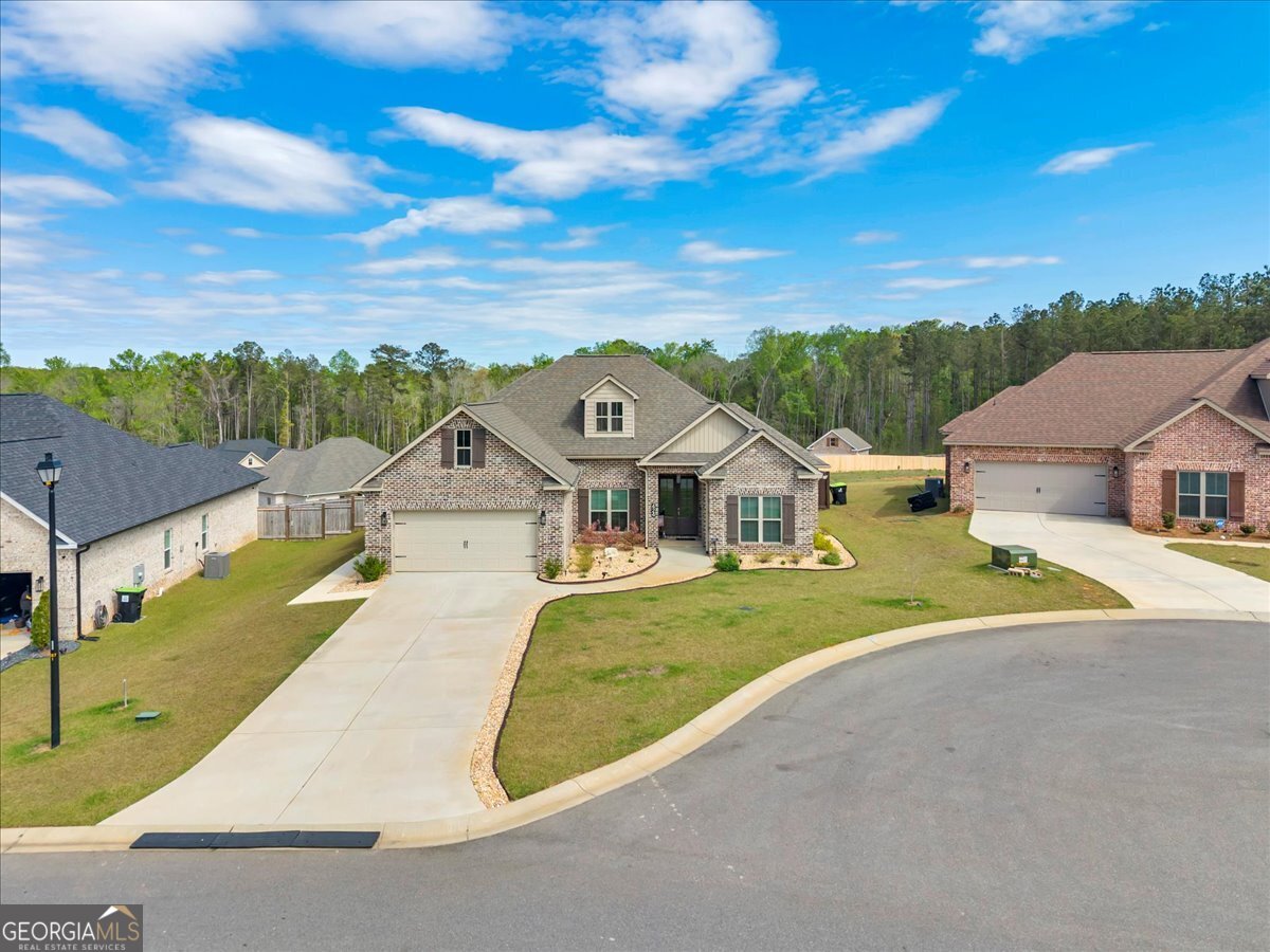 424 Rustic Live Oak Trail Bonaire, GA 31005 - Photo 41 of 51 an aerial view of a house with a big yard
