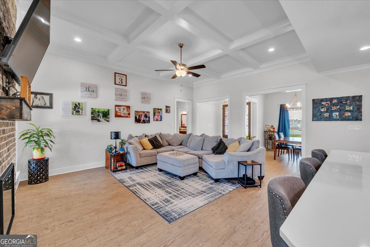 424 Rustic Live Oak Trail Bonaire, GA 31005 - Photo 8 of 51 a living room with furniture