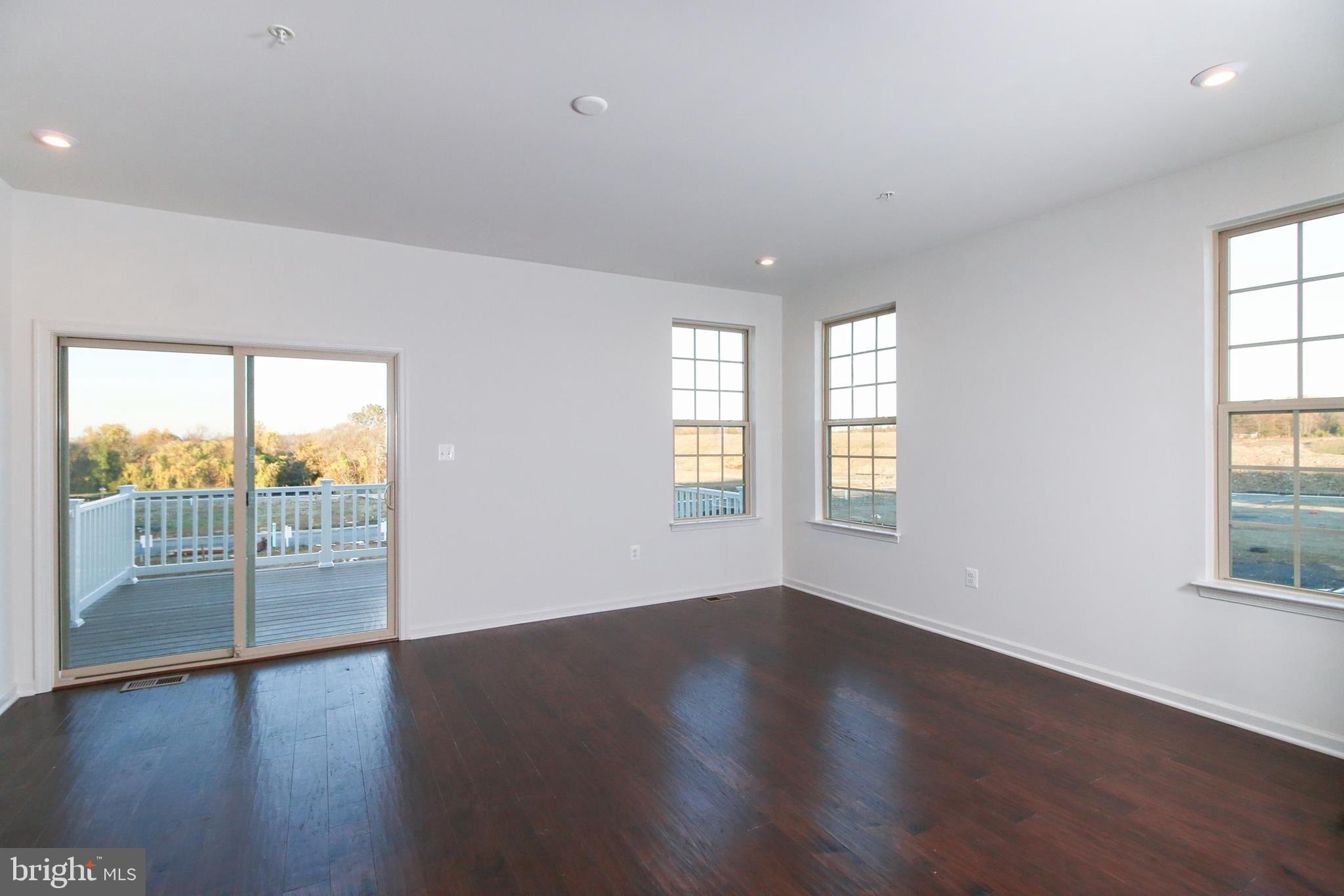 8479 Bald Eagle Lane Frederick, MD 21704 - Photo 8 of 29 Family Room opens to large deck