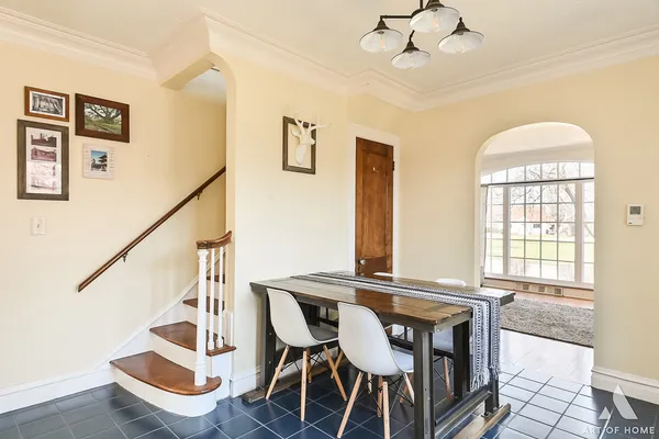 a kitchen with stainless steel appliances granite countertop a sink a refrigerator and cabinets