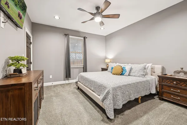 a bed room with a bed and a couch