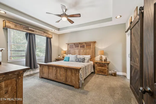 a view of a walk in closet and bathroom