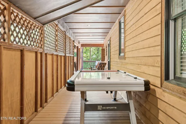a view of a backyard with sitting area