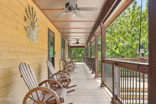 a view of a porch with furniture