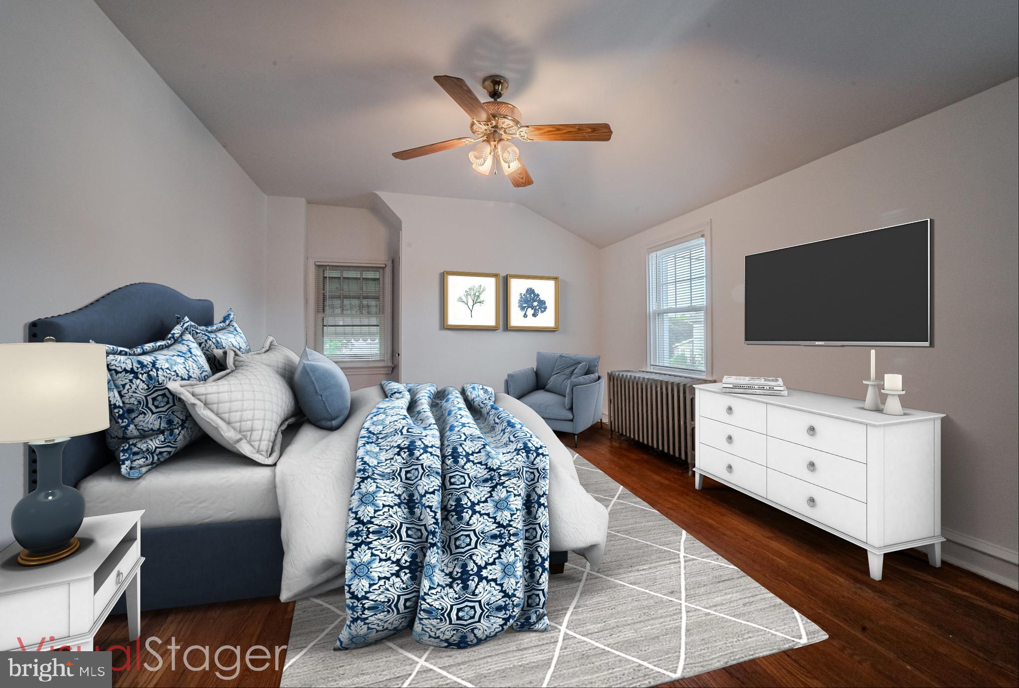 624 Gilbert Road Ridley Park, PA 19078 - Photo 23 of 36 a bedroom with furniture and a flat screen tv
