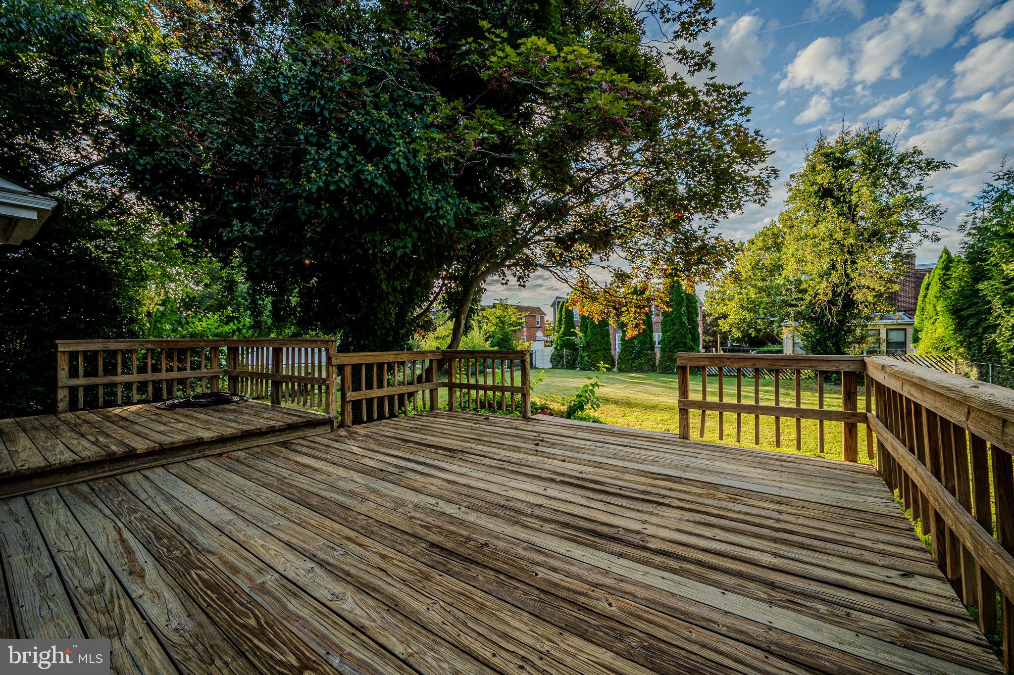 624 Gilbert Road Ridley Park, PA 19078 - Photo 33 of 36 a view of a balcony with wooden floor and fence