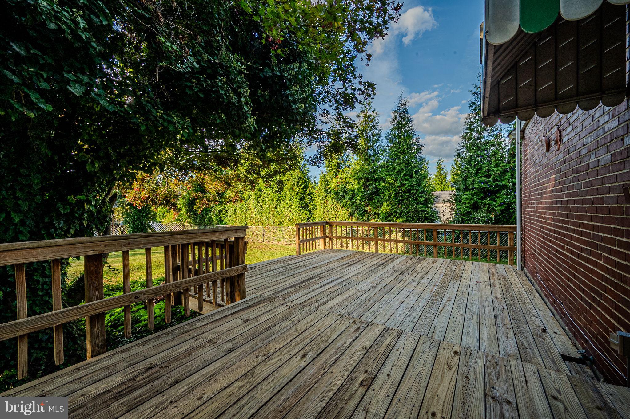 624 Gilbert Road Ridley Park, PA 19078 - Photo 34 of 36 a view of balcony with wooden floor and fence