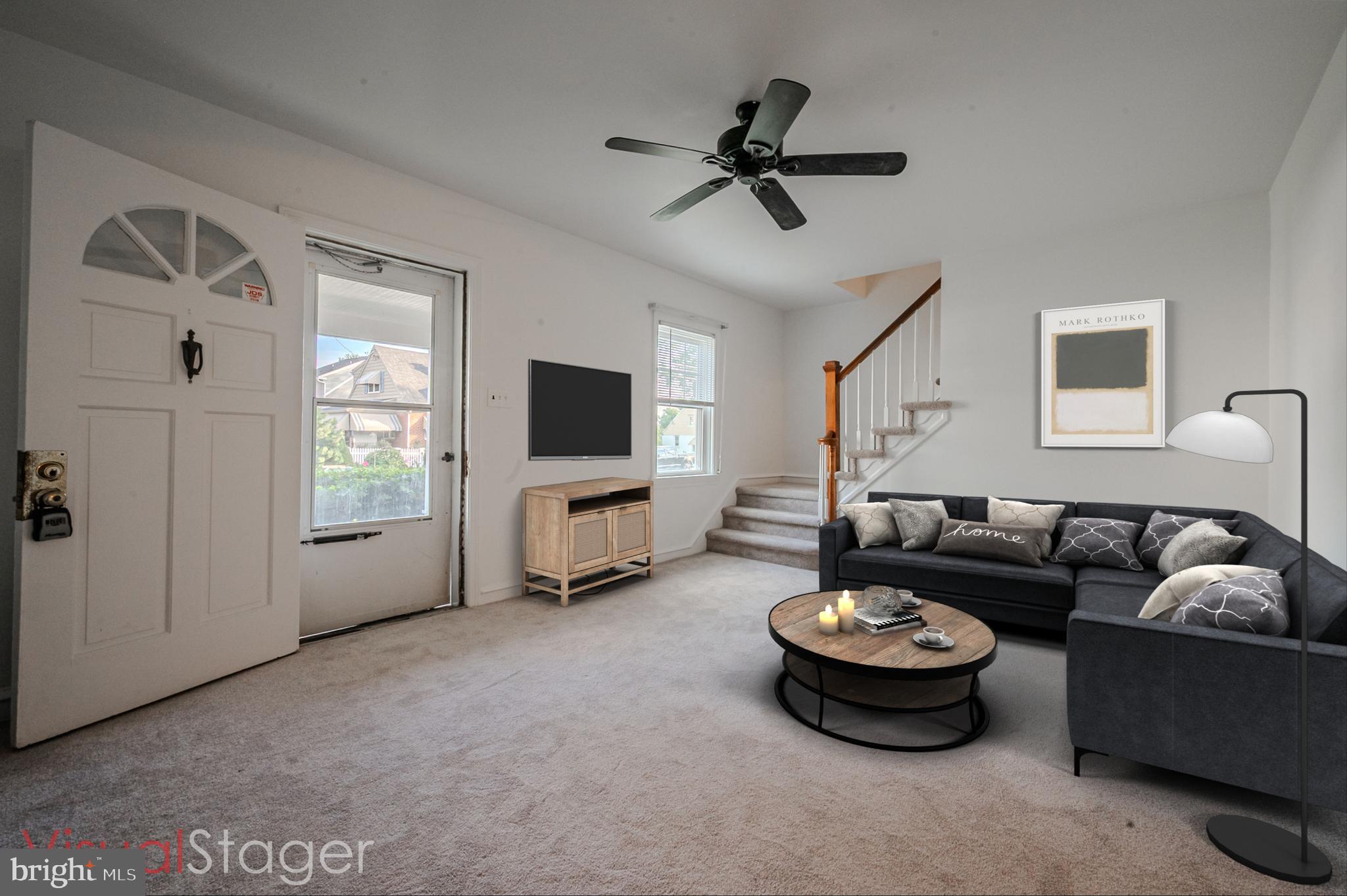 624 Gilbert Road Ridley Park, PA 19078 - Photo 4 of 36 a living room with furniture and a flat screen tv