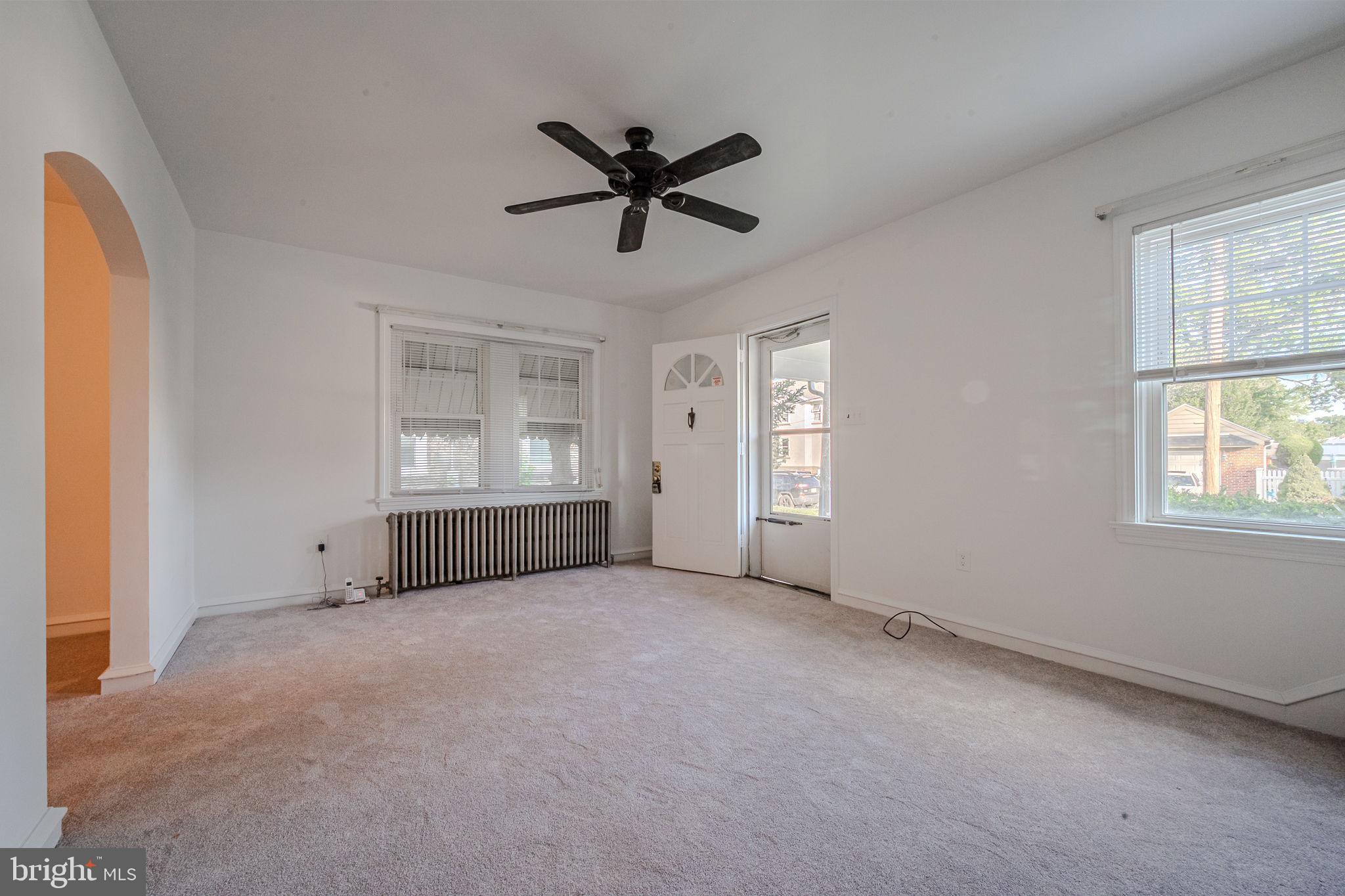624 Gilbert Road Ridley Park, PA 19078 - Photo 6 of 36 a view of an empty room with a window