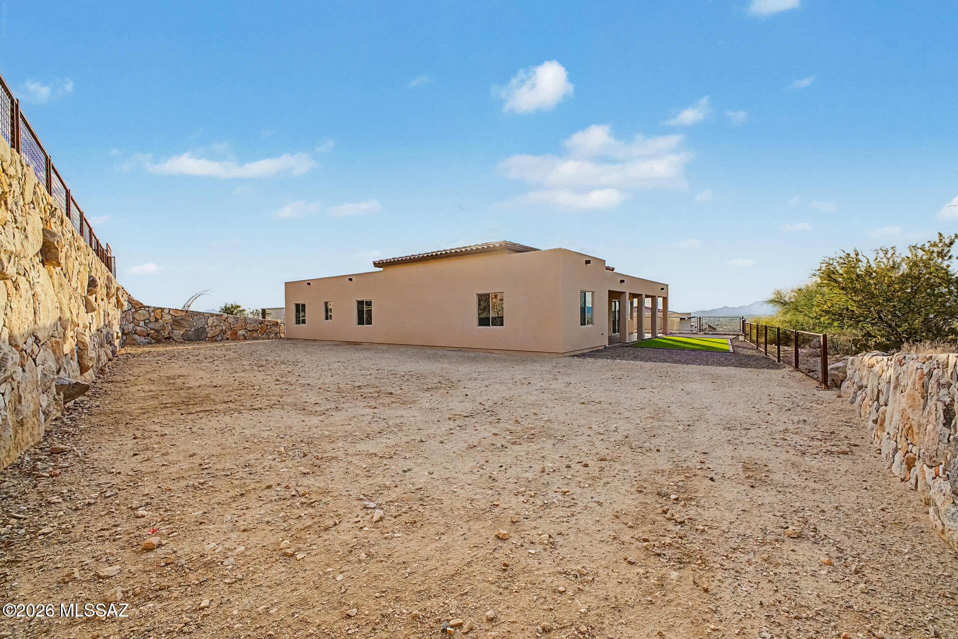 2399 Della Roccia Court Tucson, AZ 85737 - Photo 34 of 34 a view of a house with a yard