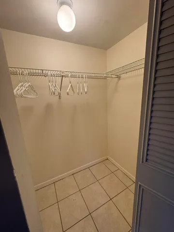 a view of a room with racks on the wall