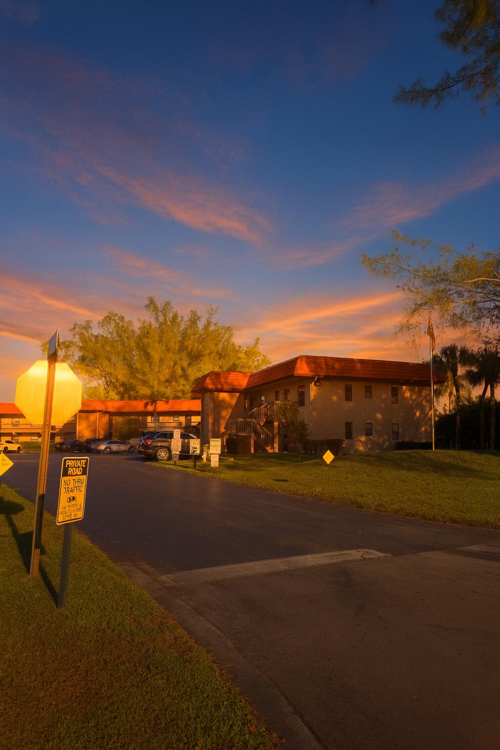 21890 Lake Forest Circle, Unit 102 Boca Raton, FL 33433 - Photo 17 of 24 a view of a city street